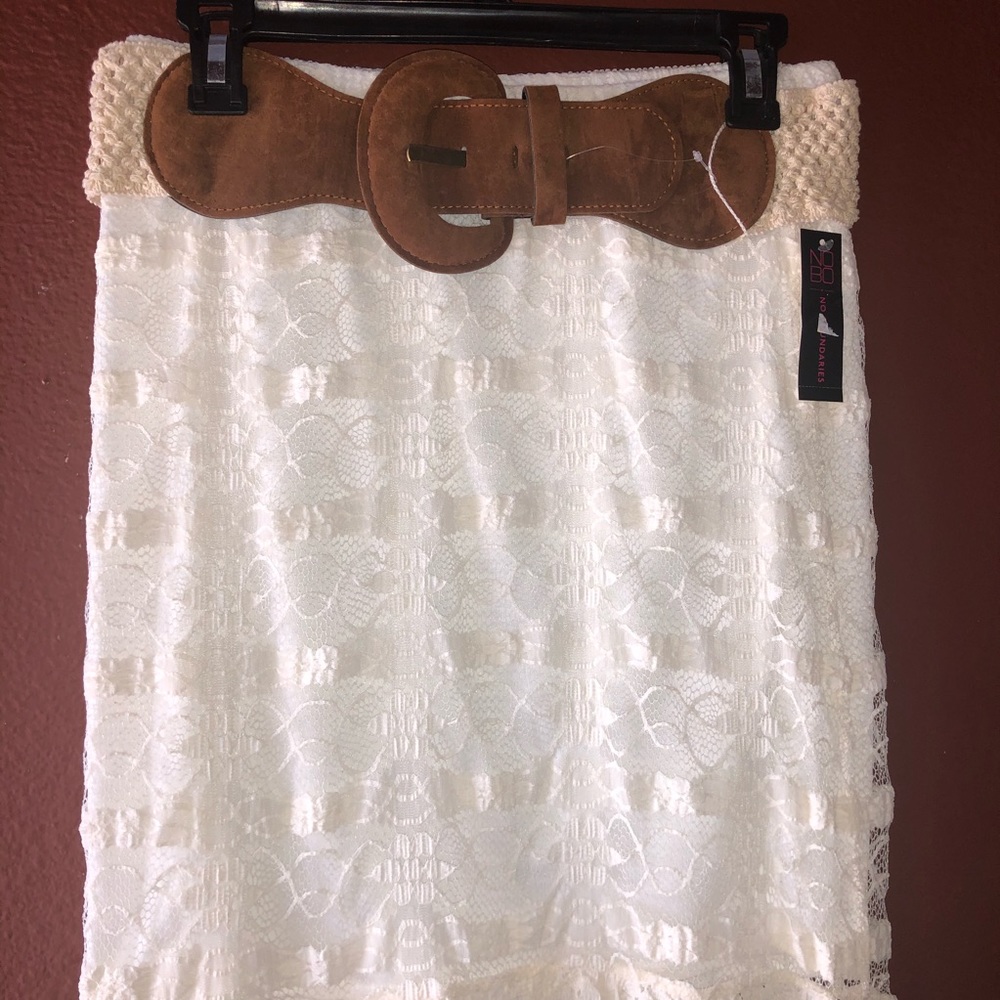 White long skirt with a  waist belt.
